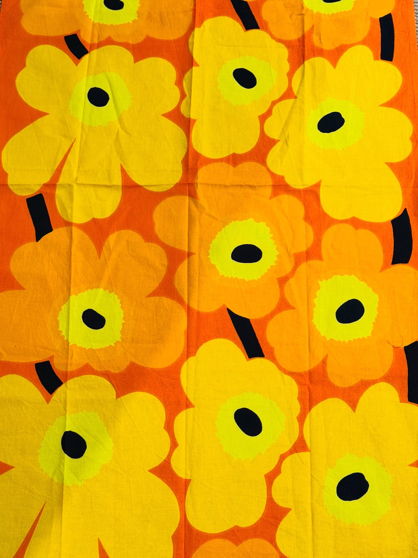 Marimekko orange ”Unikko” by designer Maija Isola, made in Finland