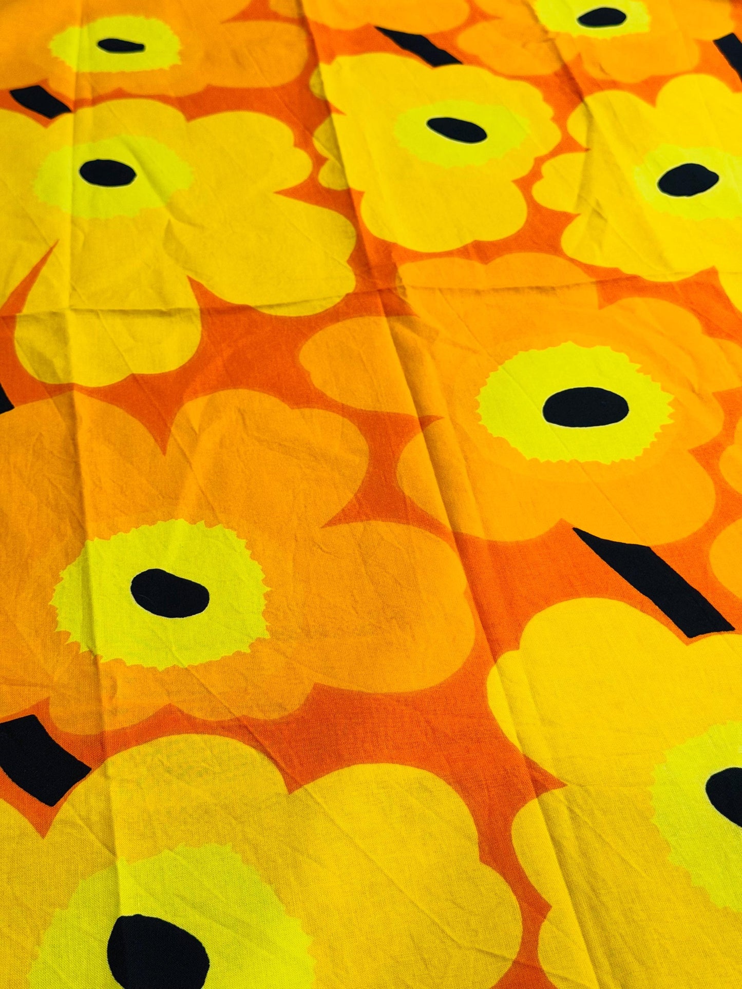 Marimekko orange ”Unikko”  by designer Maija Isola, made in Finland