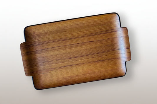 A beautiful  Midcentury Modern design teak serving tray with black lacquer on the back , 1960s