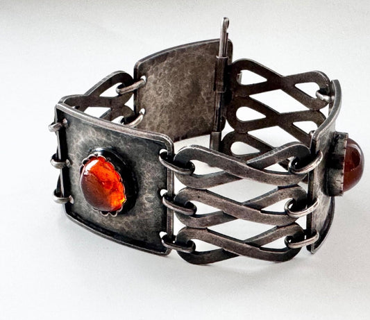 A rare and stunning statement modernist 800 silver and amber bracelet made by Orno in Poland.