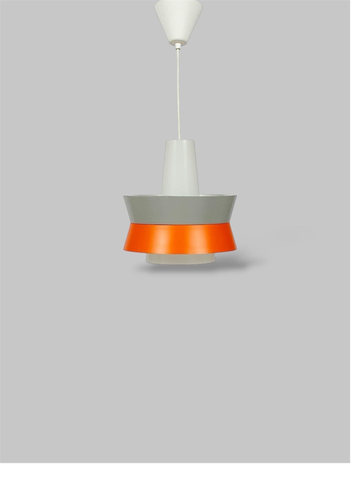 An elegant Mid century modern Danish Vintage pedant lamp by Danish company Lyfa in the 1960s