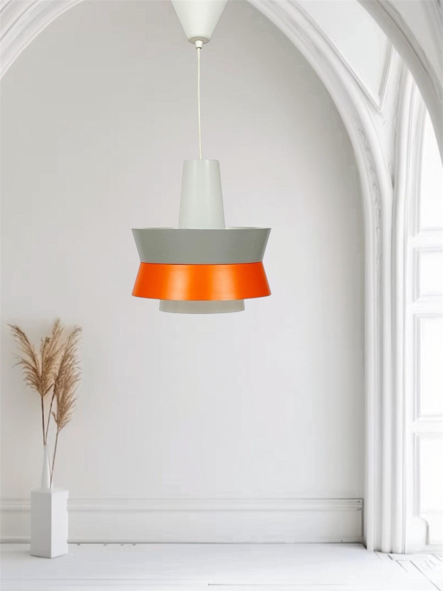 An elegant Mid century modern Danish Vintage pedant lamp by Danish company Lyfa in the 1960s
