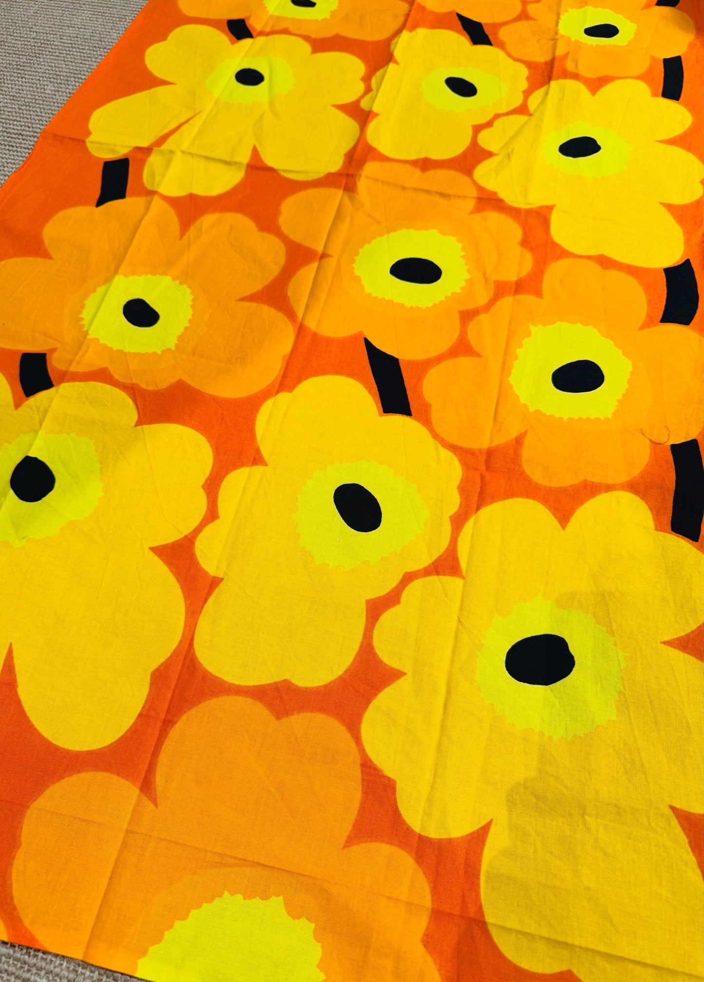 Marimekko orange ”Unikko”  by designer Maija Isola, made in Finland