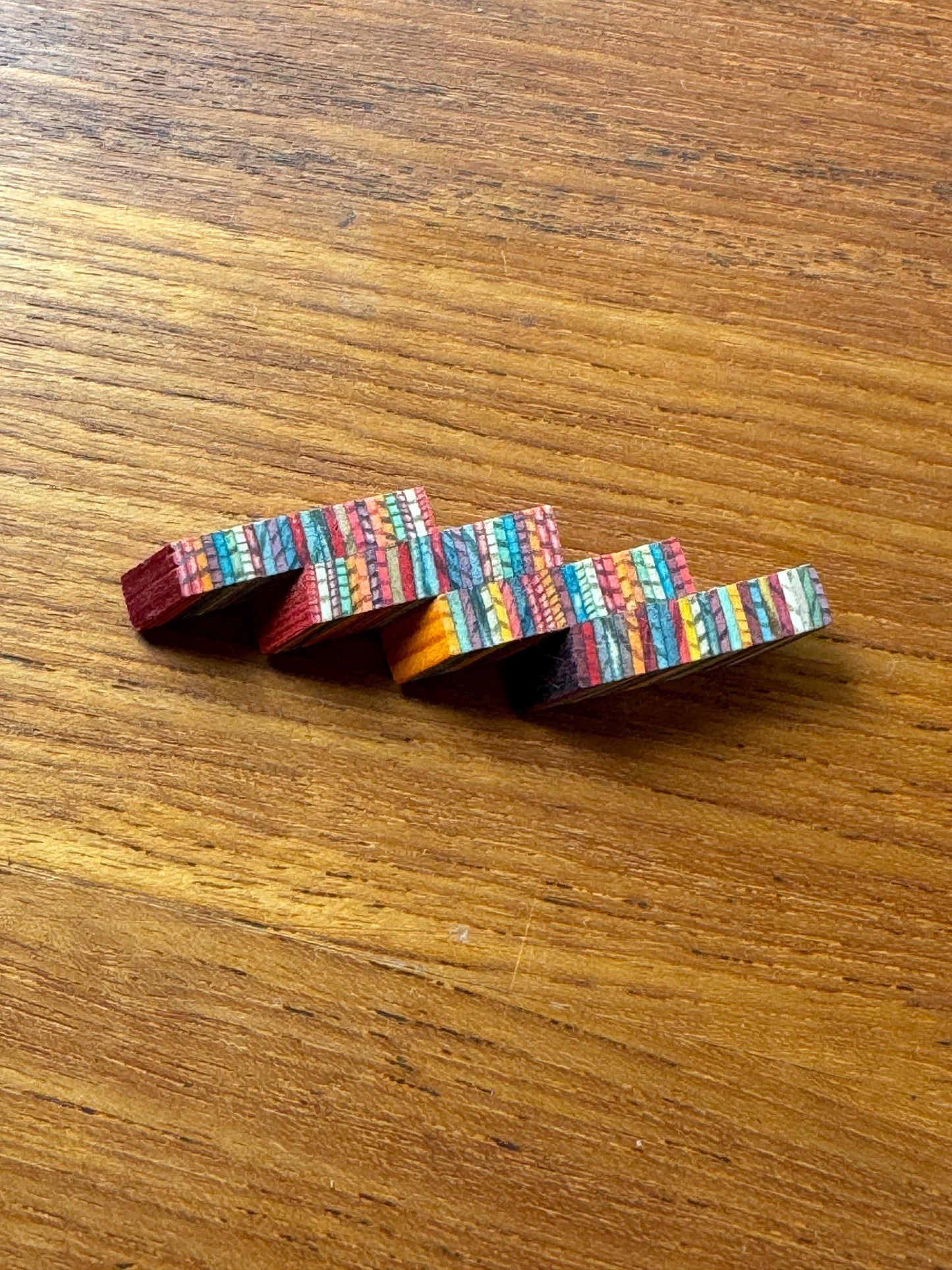 A beautiful wood brooch named folk dance by designers Raili & Jussi Konttinen, hand made in Finland