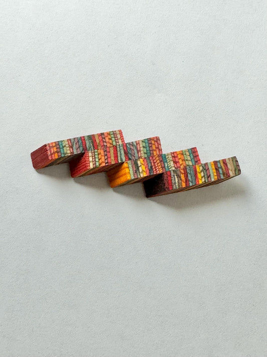 A beautiful wood brooch named folk dance by designers Raili & Jussi Konttinen, hand made in Finland