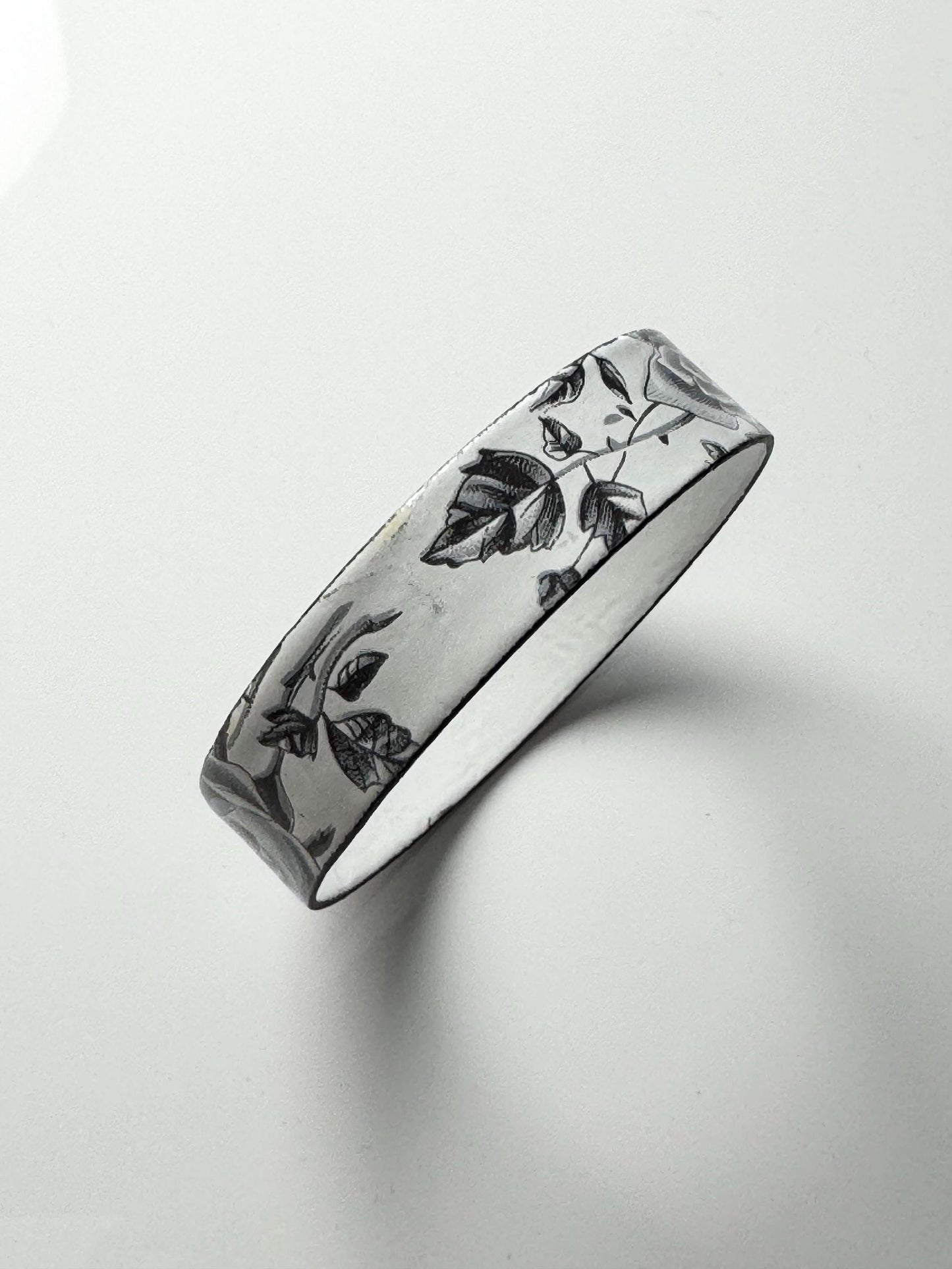 Vintage enamel Bracelet with rose pattern. Made in Finland, 1970s